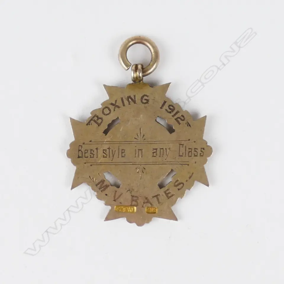 A 9ct. gold Wellington Boys College boxing medallion Image 1++