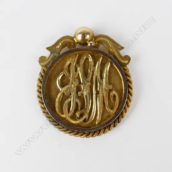 An unmarked 9ct. gold Carlton Bowling Club medallion