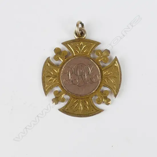 A 9ct. gold Raikaia Miniature Rifle Club medallion