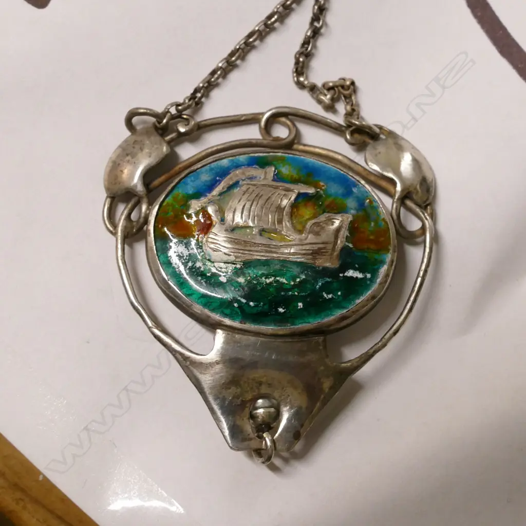 A Reuben Watts silver and enamel pendant Image 1++