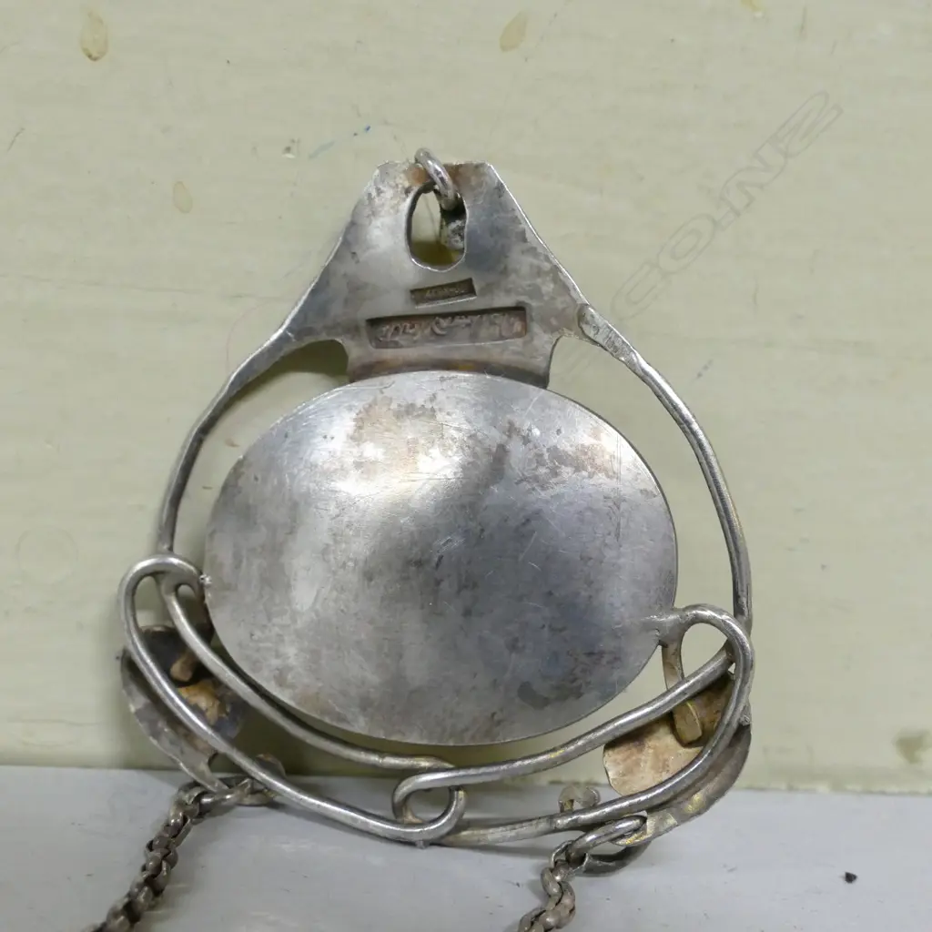 A Reuben Watts silver and enamel pendant Image 1++