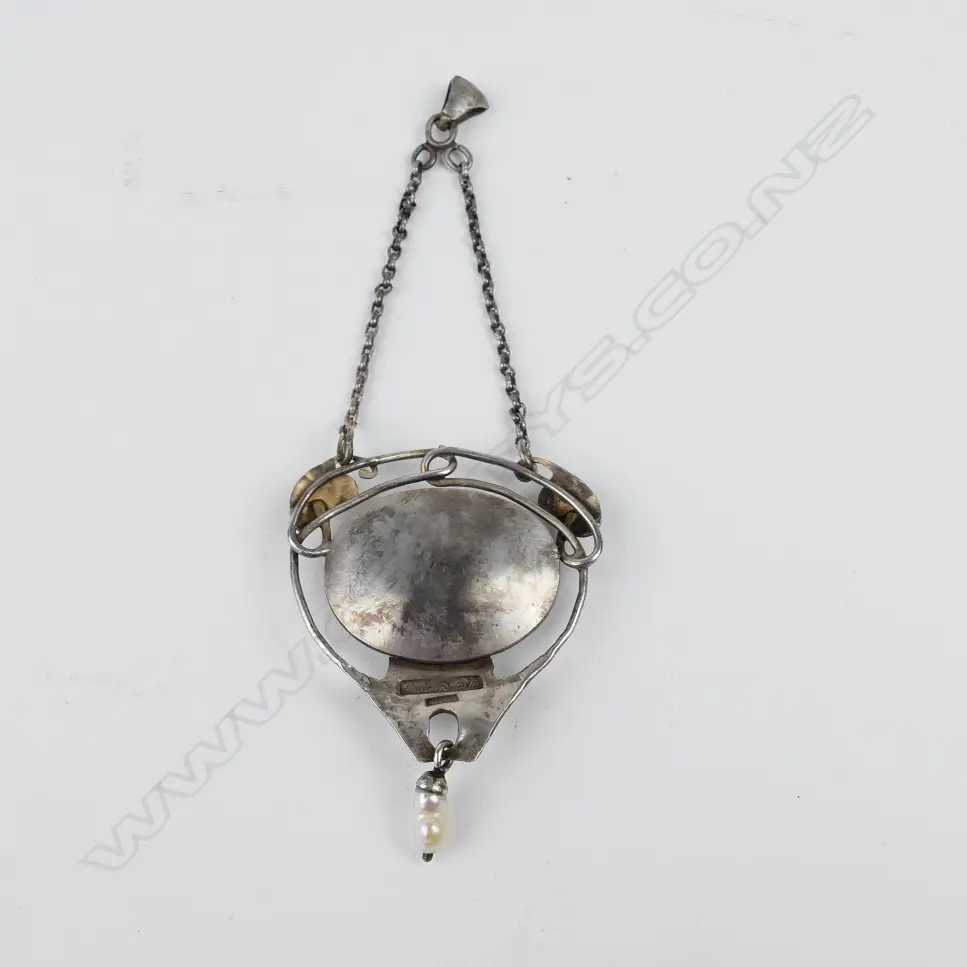 A Reuben Watts silver and enamel pendant Image 1++