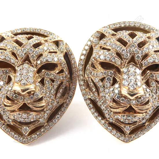 A pair of 18ct rose gold and diamond earrings