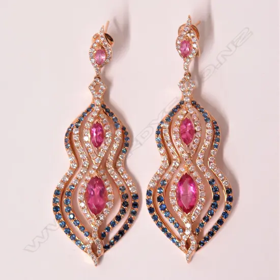 A pair of lady's large modern 18ct. rose gold rubellite diamond and sapphire earrings