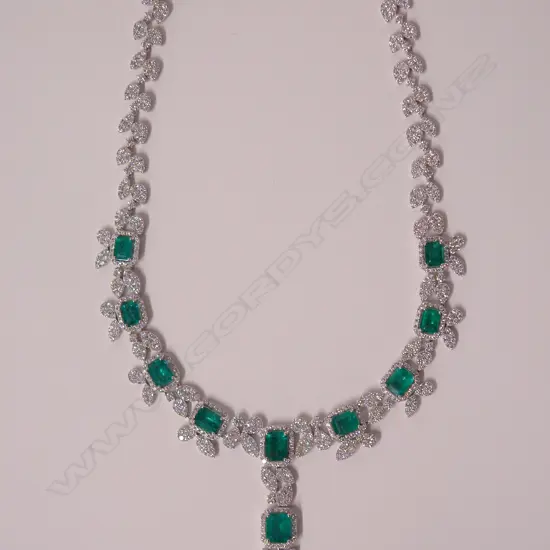 An impressive modern lady's 18ct. white gold emerald and diamond necklace
