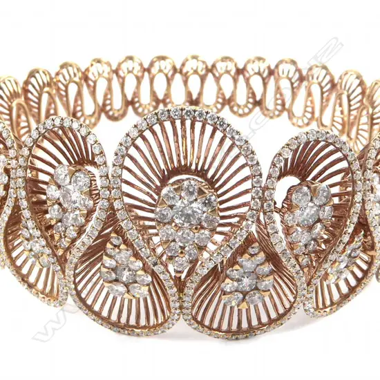 An 18ct rose gold and diamond bracelet