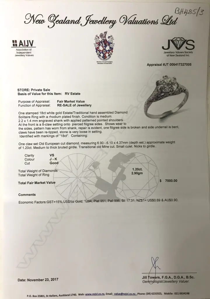 An estate 18ct white gold and diamond solitaire ring Image 1++