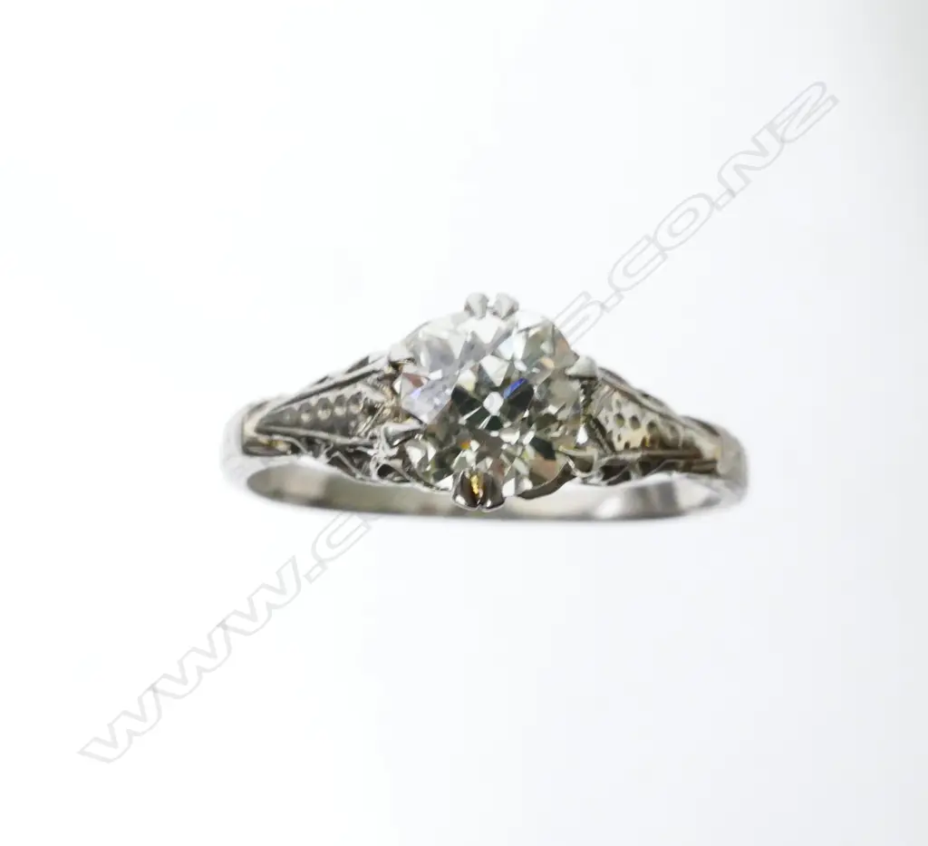 An estate 18ct white gold and diamond solitaire ring Image 1++