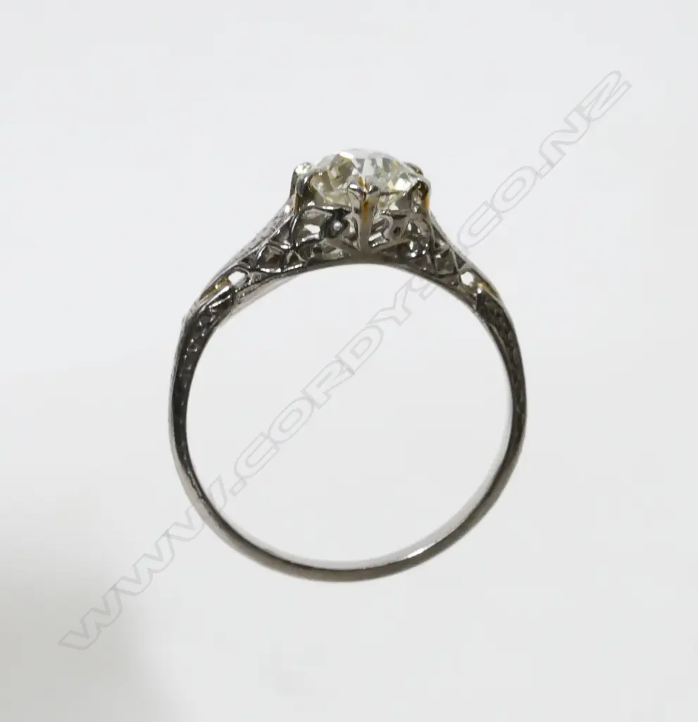 An estate 18ct white gold and diamond solitaire ring Image 1++