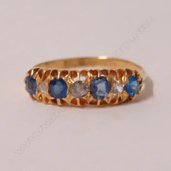 A late Victorian 18ct. yellow gold sapphire and diamond bridge ring