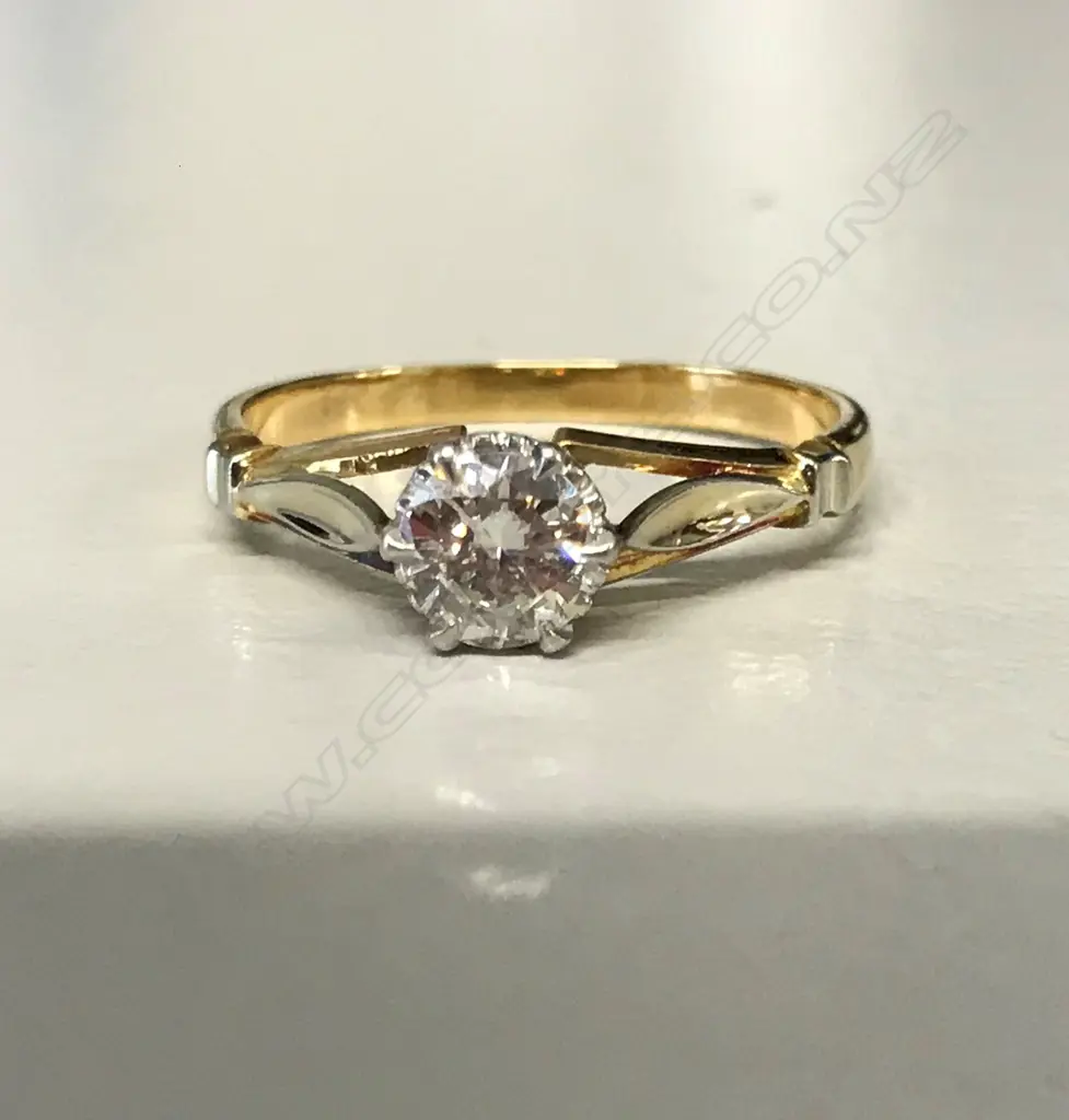 An 18ct. gold and diamond solitaire ring Image 1++