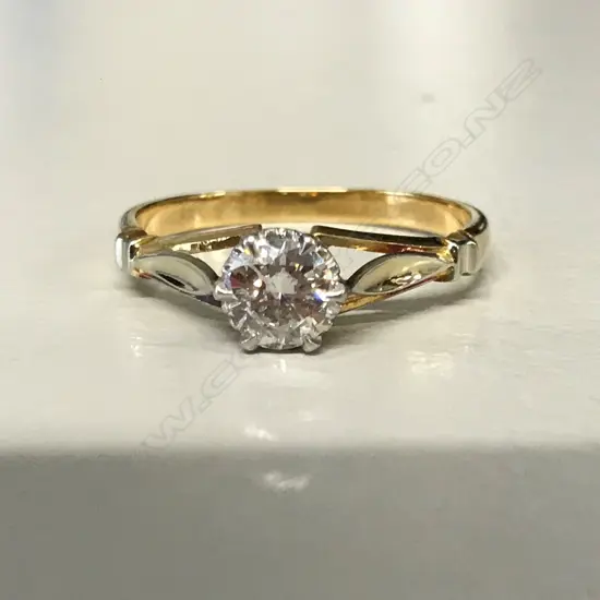 An 18ct. gold and diamond solitaire ring