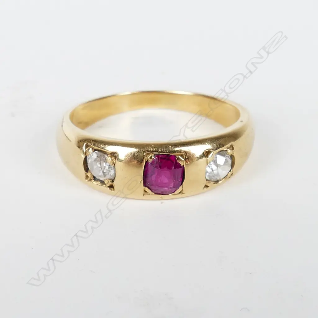 An estate 18ct. gold diamond and ruby ring Image 1++
