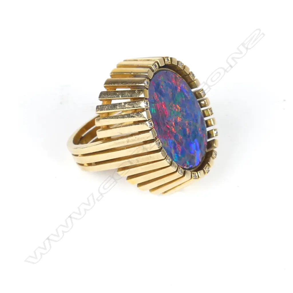 A large and impressive 9ct. gold diamonds and opal gent's ring Image 1++