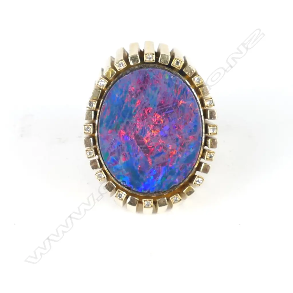 A large and impressive 9ct. gold diamonds and opal gent's ring Image 1++