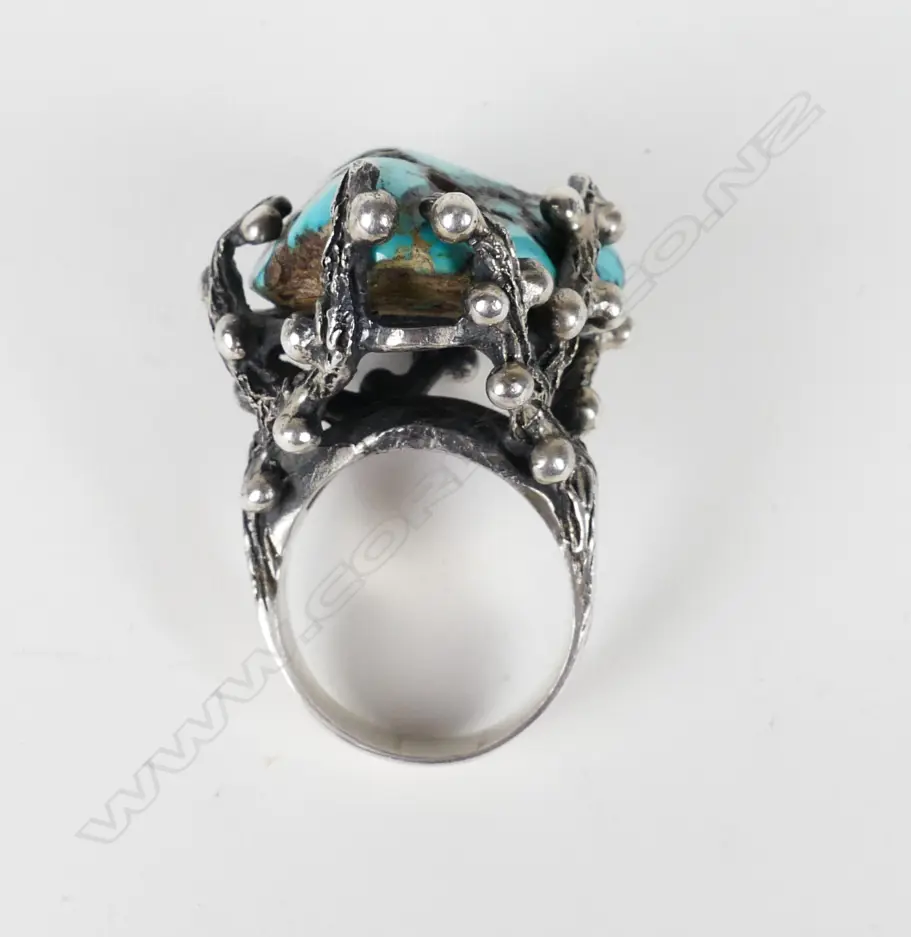 A unique vintage silver and turquoise matrix dress ring Image 1++