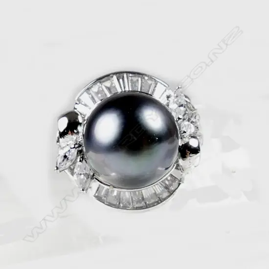 An 18ct. white gold and black pearl ring