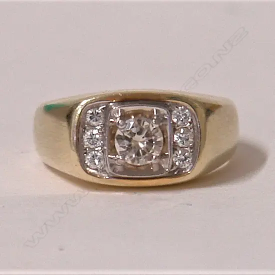 An estate 14ct. yellow gold and diamond ring