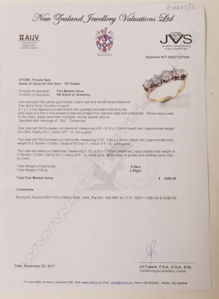 An estate 18ct. gold and five stone diamond ring Image 1++