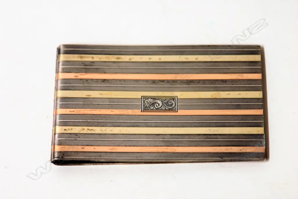 An Art Deco Cartier silver and 14ct/ bi-colour gold card case Image 1++