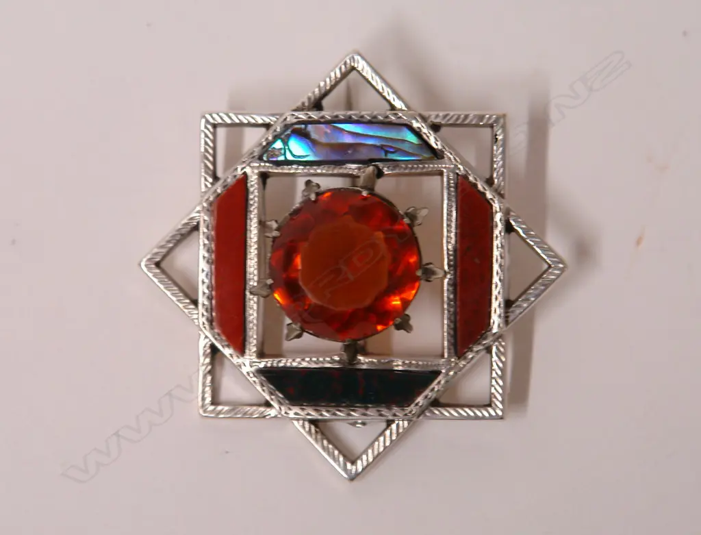 A Scottish silver and jewel set brooch Image 1++