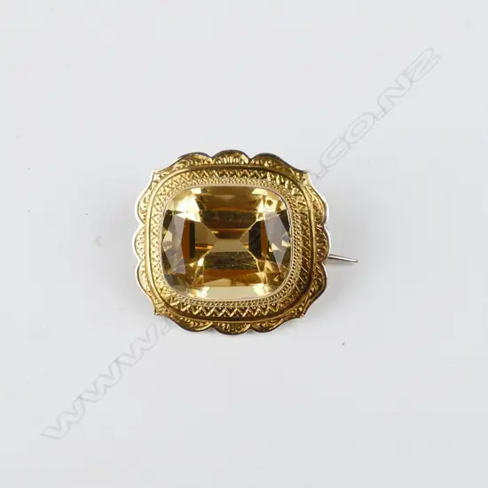 A Victorian 9ct. gold and citrine brooch