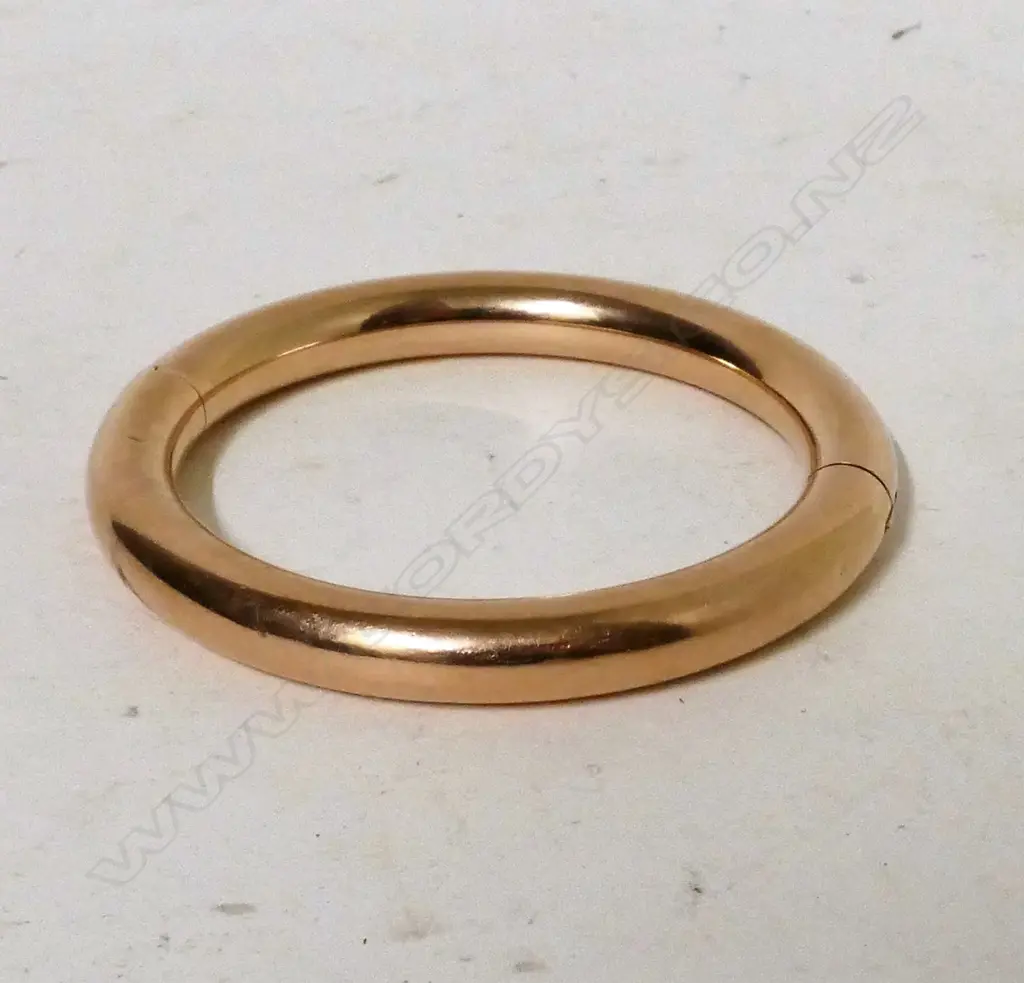 An antique gold plated bangle Image 1++
