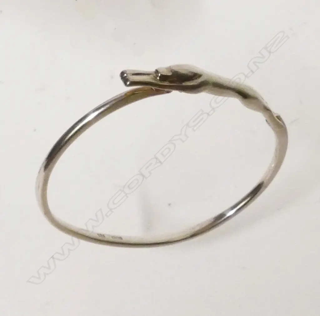 A stylish silver hinged bangle Image 1++
