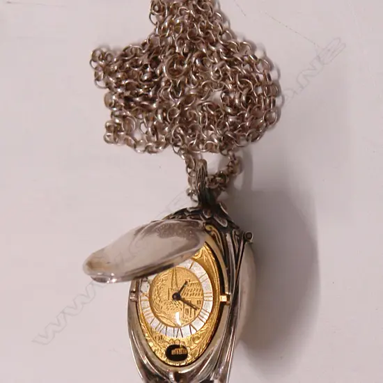 A silver pendant watch