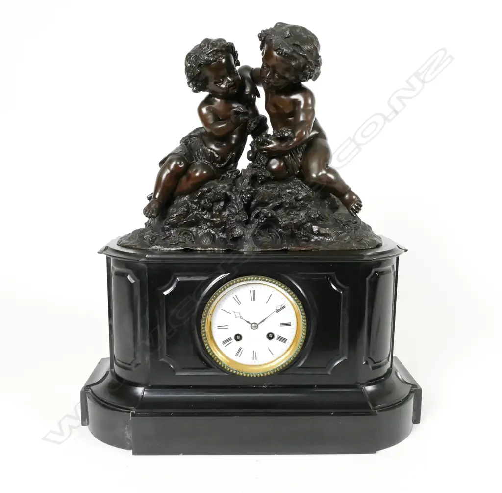 A Victorian black marble cased mantel clock Image 1++