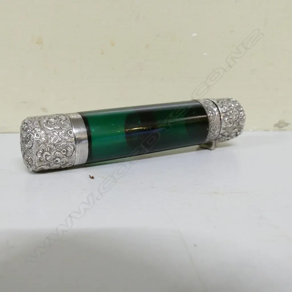 A Victorian silver tall green glass double ended scent bottle Image 1++