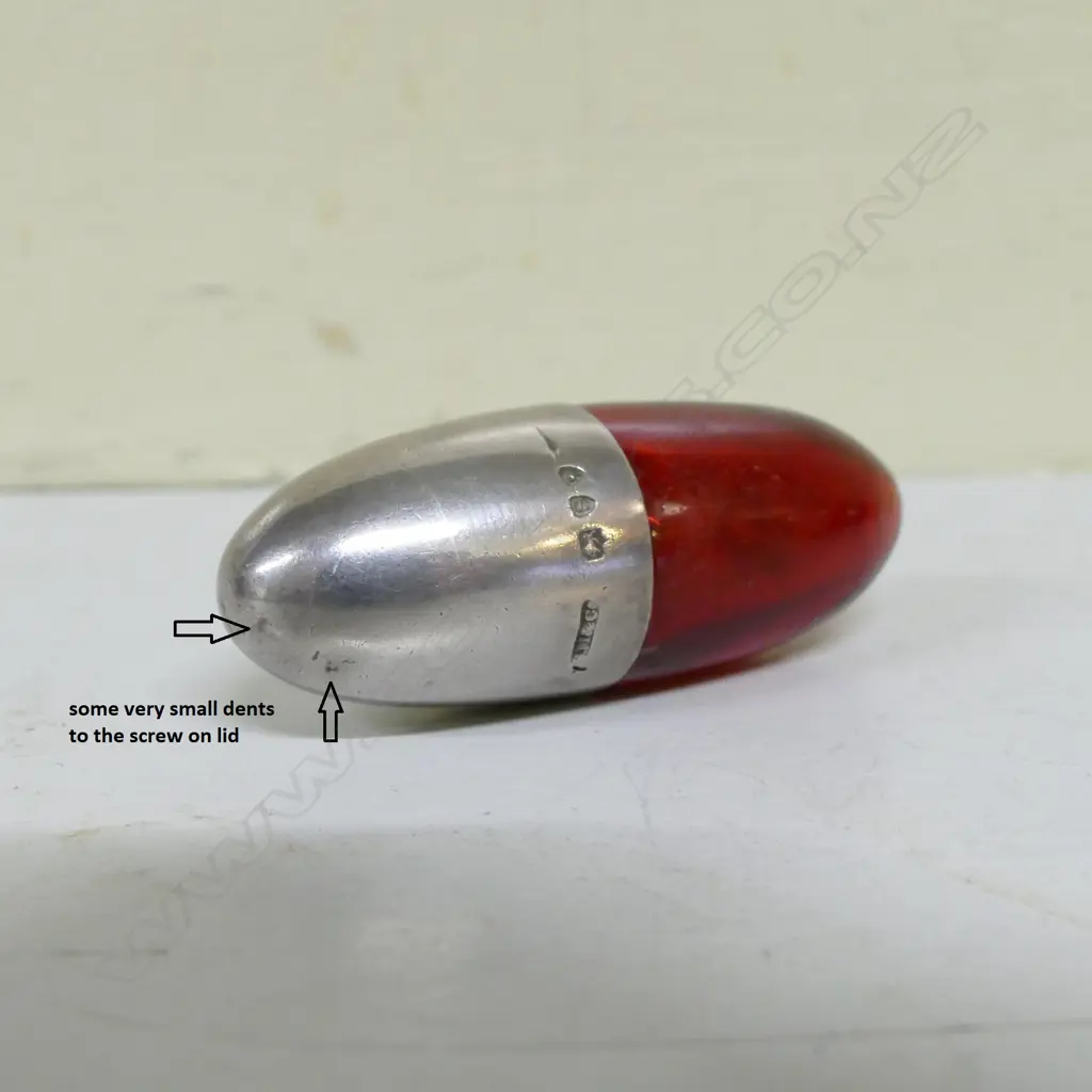 A small late Victorian silver ruby glass tear drop scent bottle Image 1++