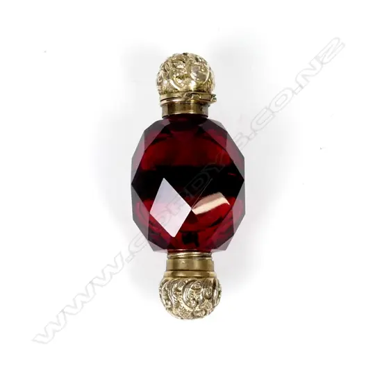 A Victorian silver gilt double ended ruby tear drop scent bottle