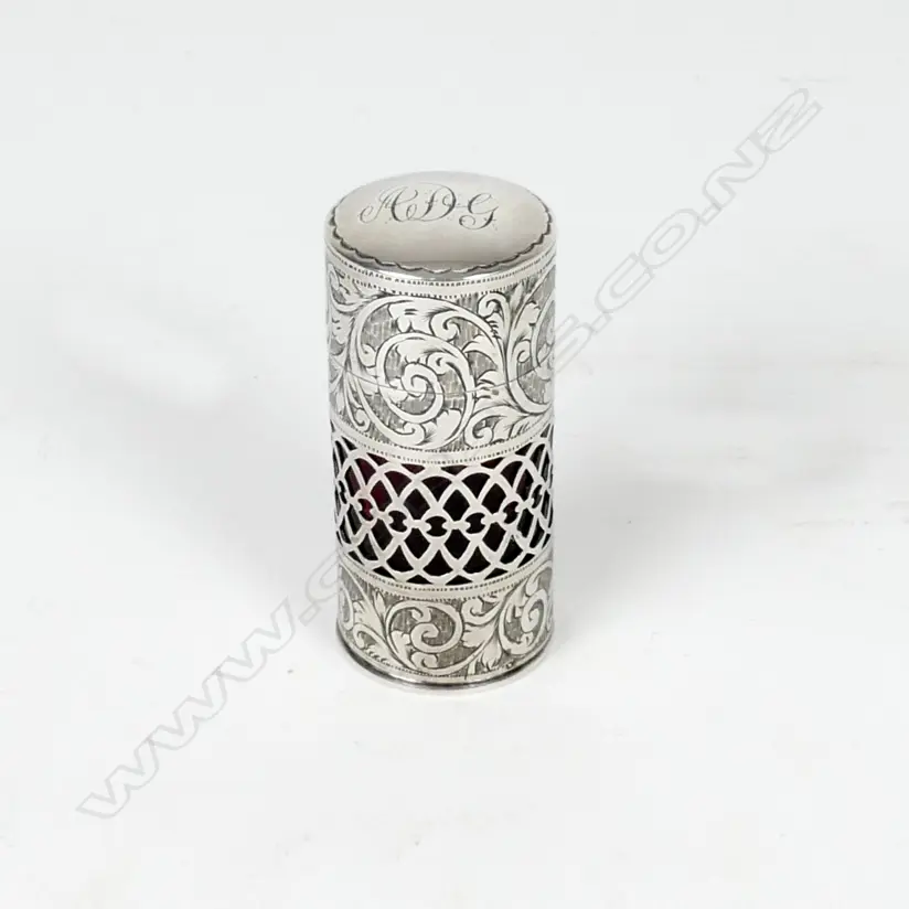 A silver sleeved ruby glass scent bottle Image 1++