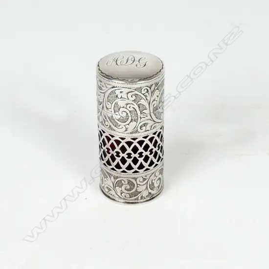 A silver sleeved ruby glass scent bottle