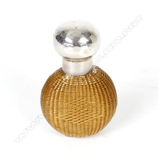 A late Victorian silver top basket weave scent bottle