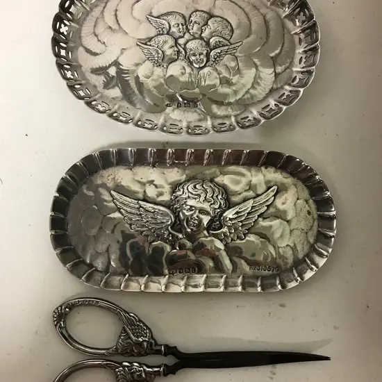 Two small silver pin trays