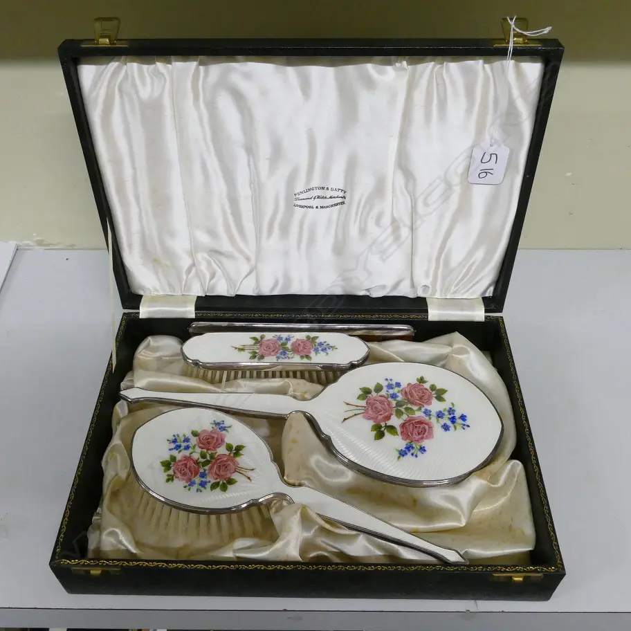 A three-piece silver dressing table set Image 1++
