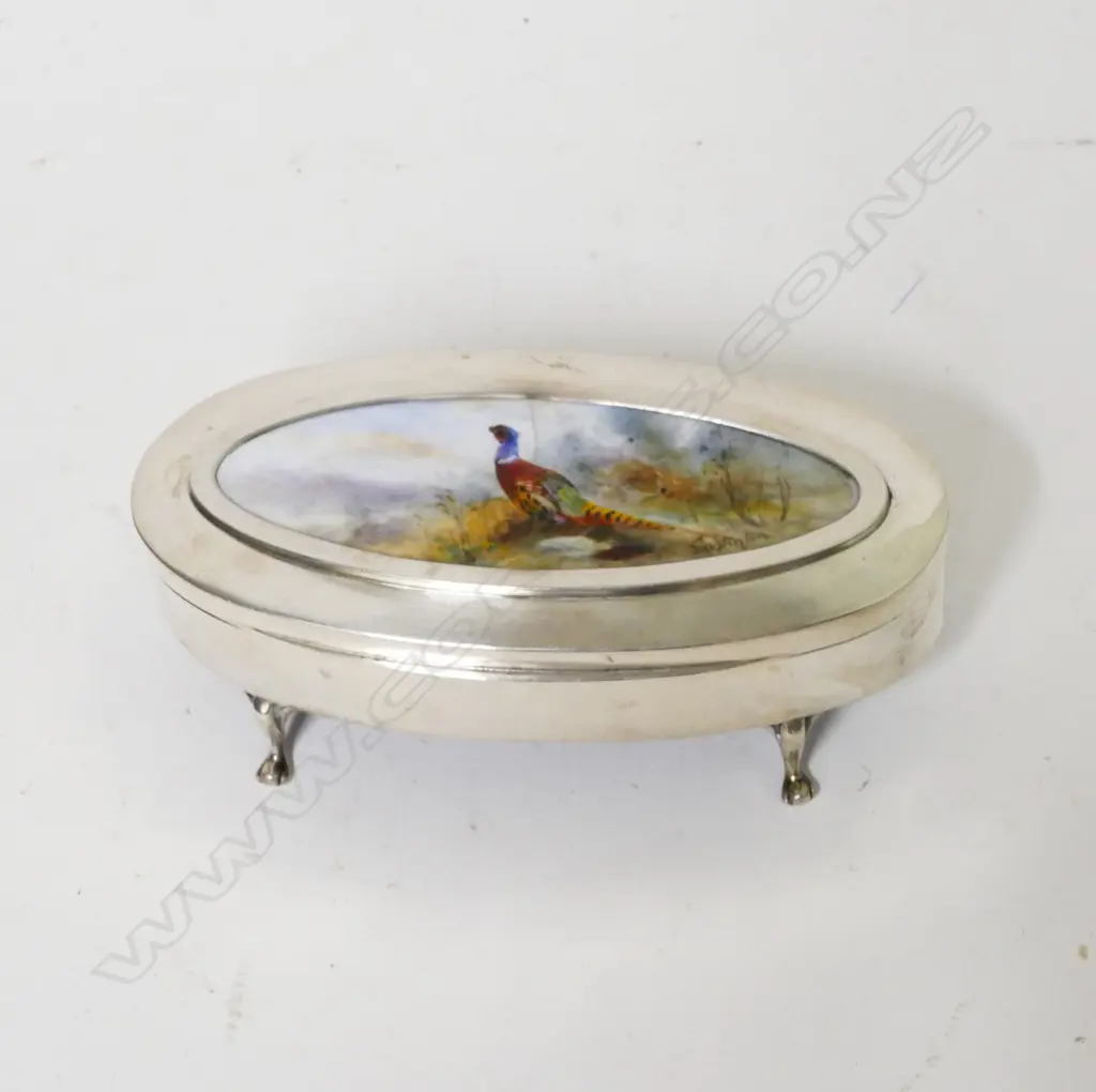 A silver lidded trinket box Image 1++