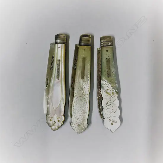 Three silver and mother-of-pearl folding fruit knives