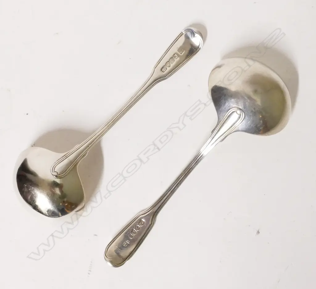A pair of Georgian fiddle and thread silver sauce ladles. London 1799 by William Eley and William Fearn Image 1++