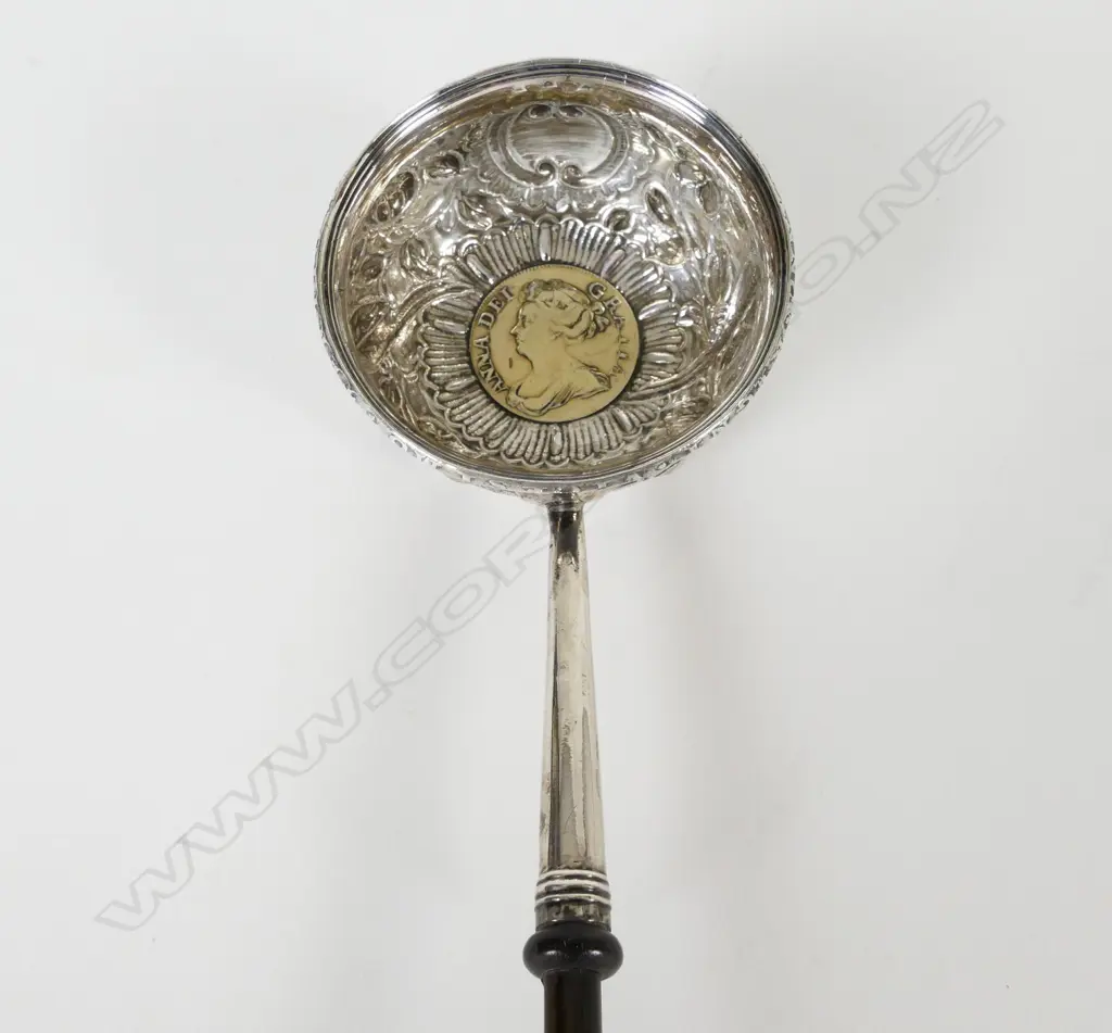 An 18thC silver toddy ladle Image 1++