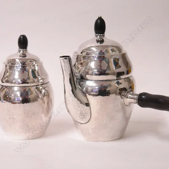 A Georg Jensen 1922 silver coffee pot and lidded sugar bowl