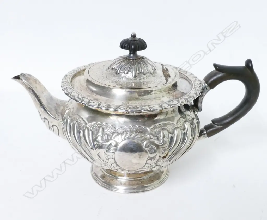 A small decorative Victorian silver teapot Image 1++