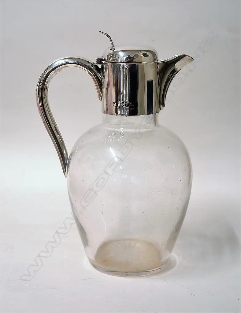 A late Victorian silver mounted glass claret jug Image 1++