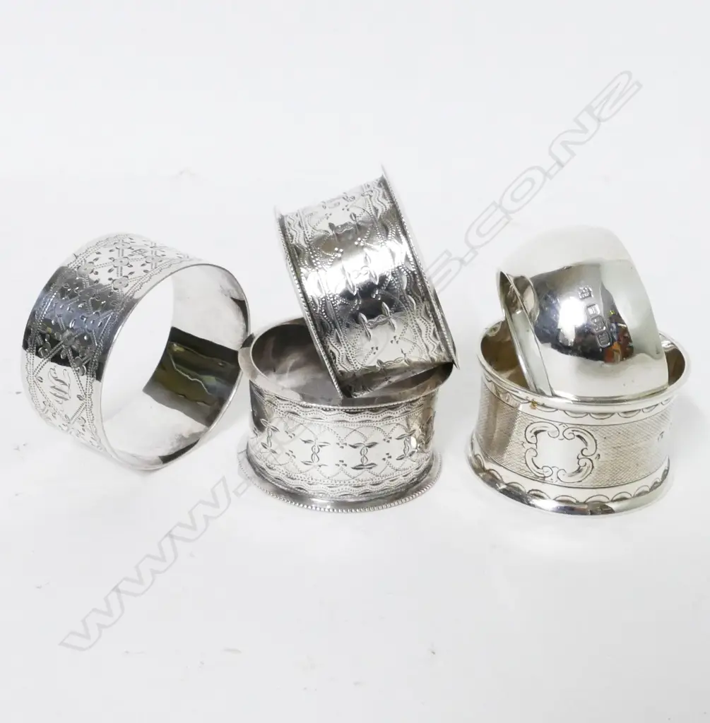 Five silver napkin rings Image 1++