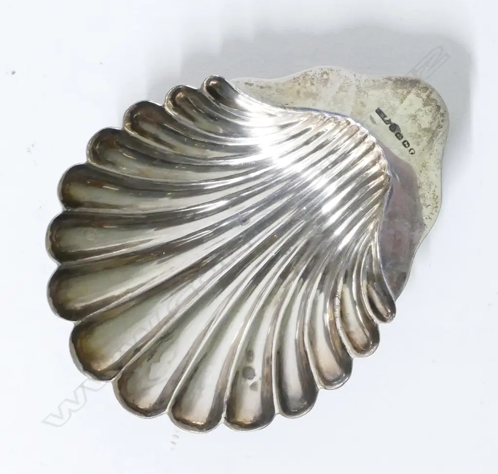 A Victorian silver scallop butter dish Image 1++