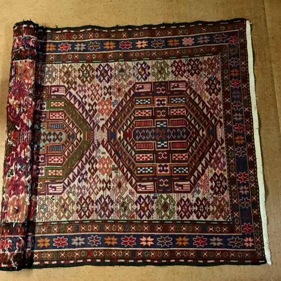 A good quality flat extra weft Sumak Caucasian rug
