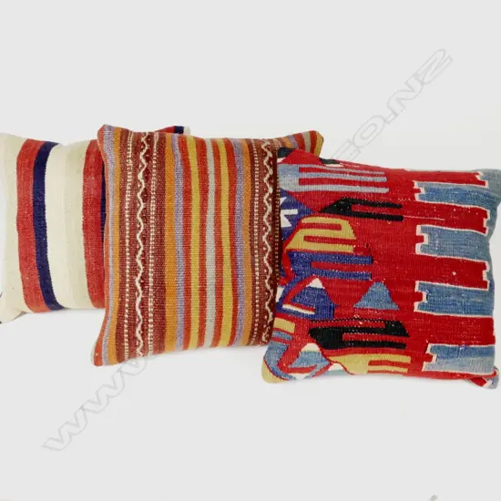 #134(a) THREE KILIM CUSHIONS 