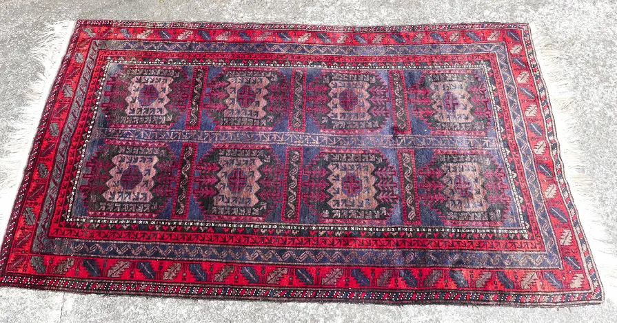 A hand knotted all wool Baluchi rug Image 1++